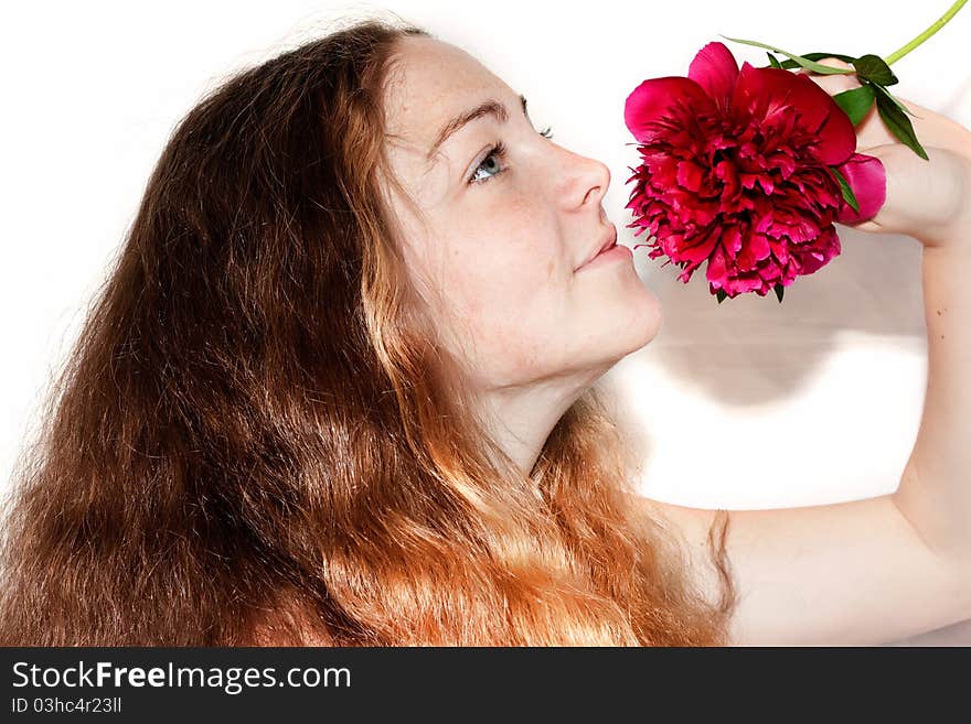 Beautiful girl with a pion in the hands isolated on white background. Beautiful girl with a pion in the hands isolated on white background