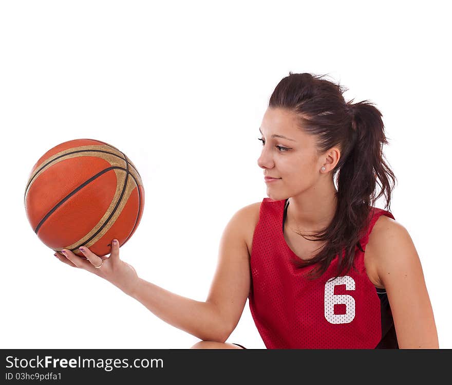 Basketball player holding basket ball, isolated on a white background