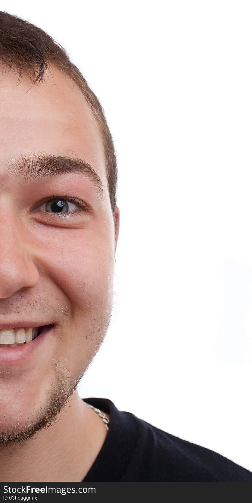 Half face of a man isolated on white