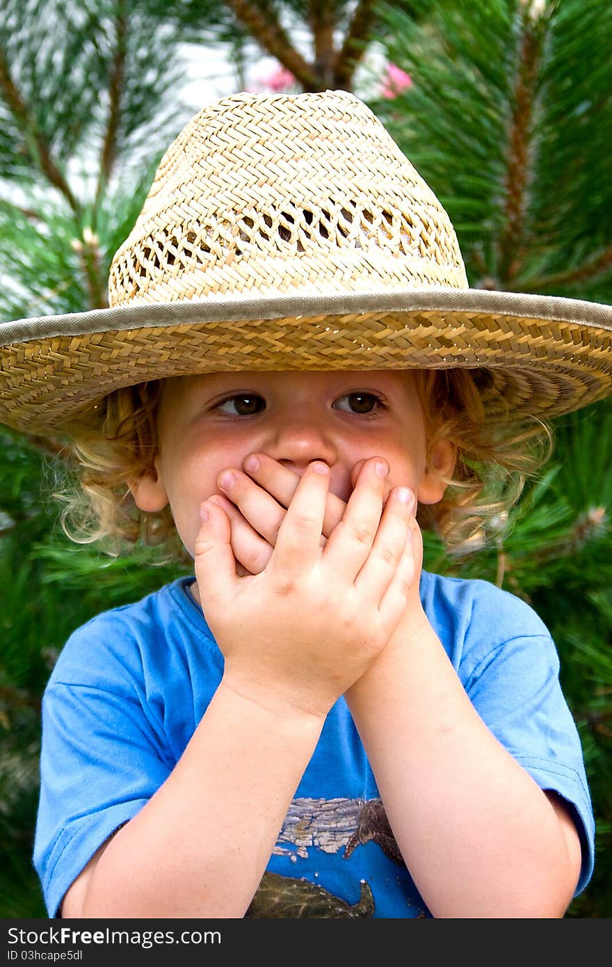 Little boy in a big hat