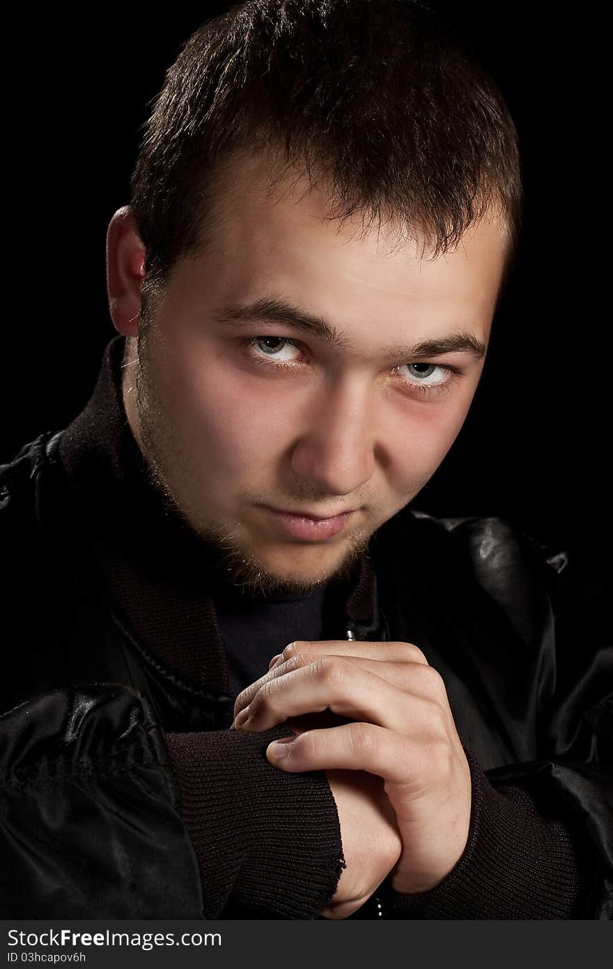 Teenager in boxer pose, in black background. Teenager in boxer pose, in black background