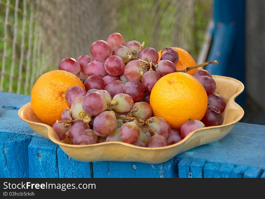 Fresh fruits rich in vitamins of a background