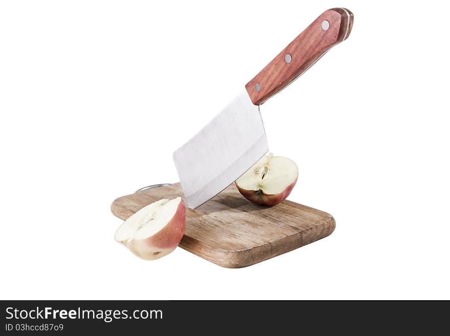 Half apples on desk with blade on white background