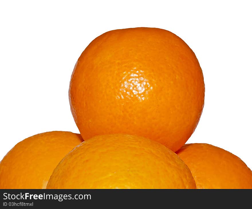 Four oranges stacked in a pyramid