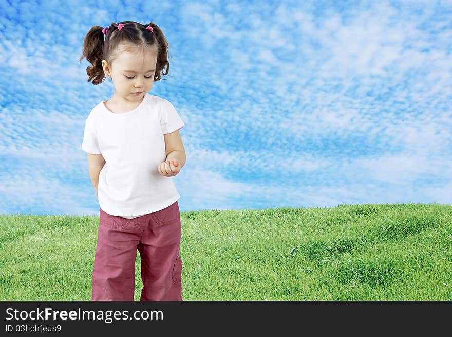 The child playing in the field