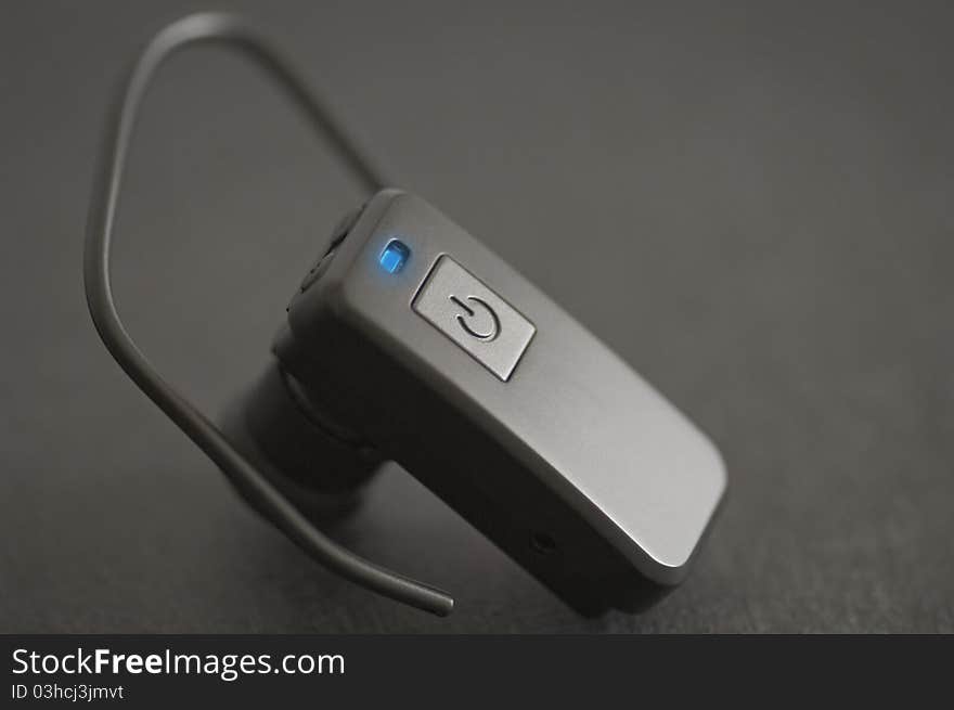 Close up of a bluetooth handsfree device