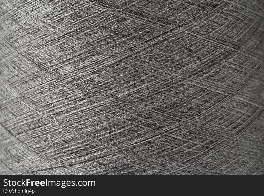 Close up of a grey yarn puff texture