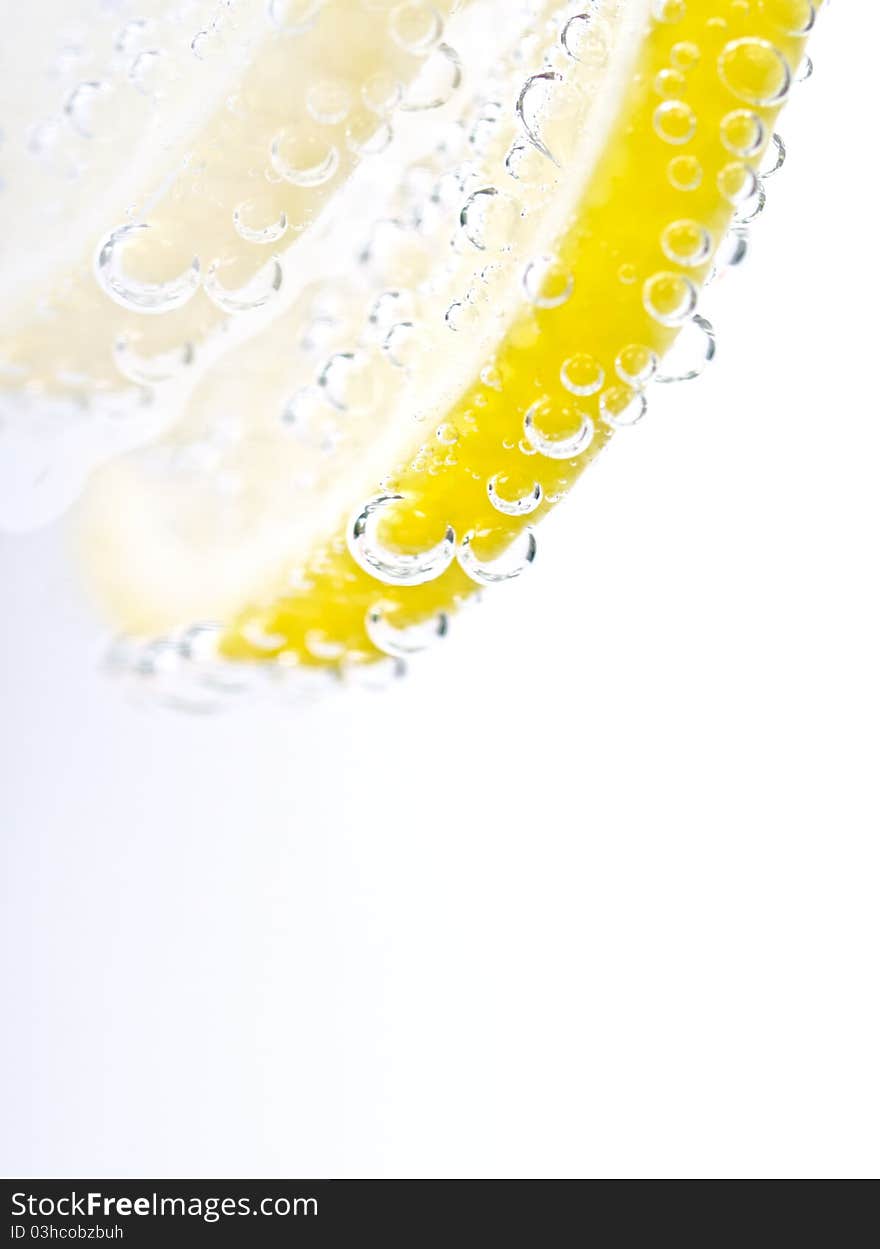 Slice of lemon covered with bubbles. Slice of lemon covered with bubbles