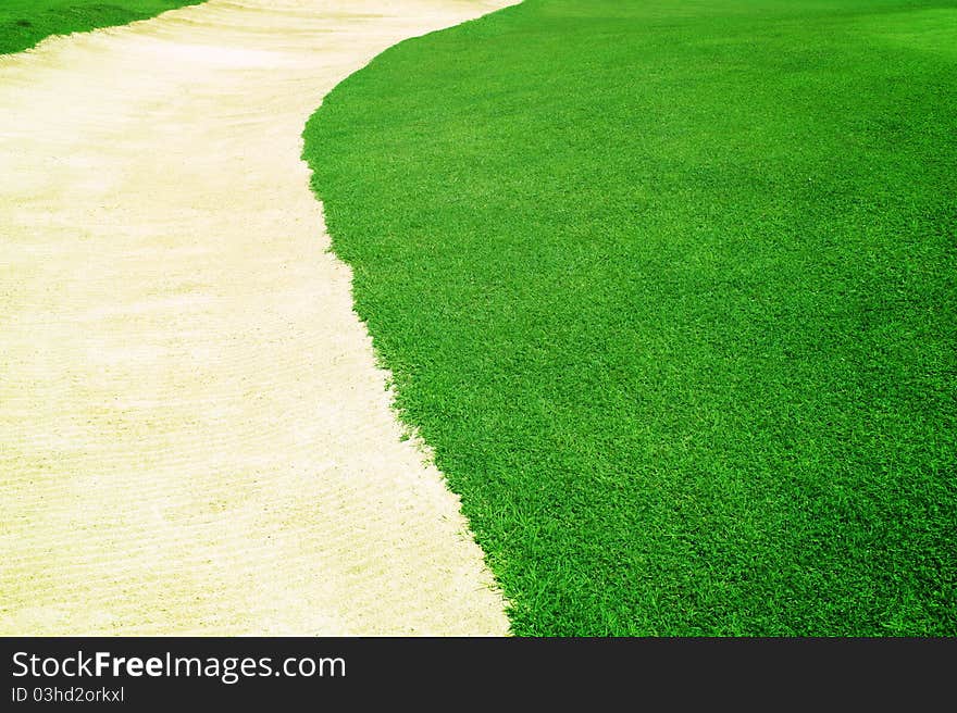 A green grass curve sand