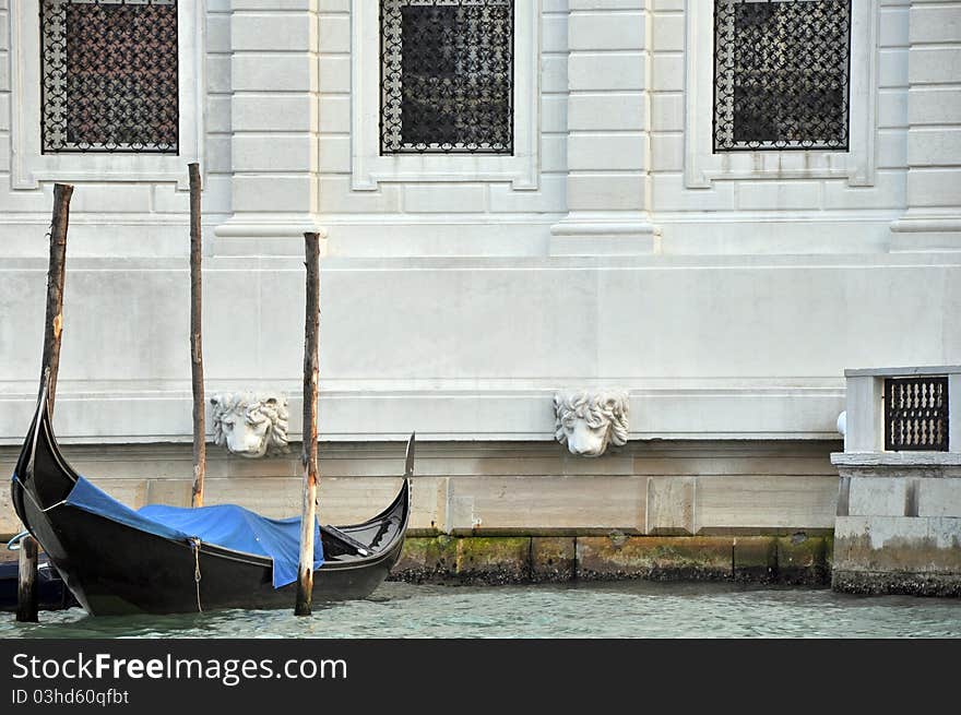 Gondola and Venetian architecture during the daytime.