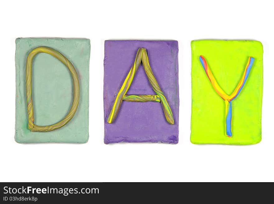 Clay letters. Words DAY isolated on the white background