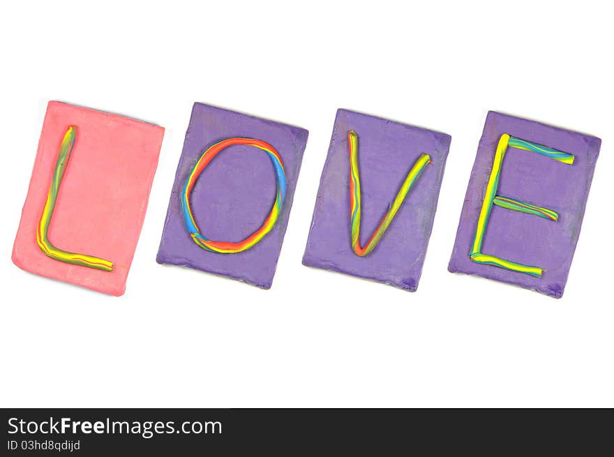 Clay letters. Words LOVE isolated on the white background