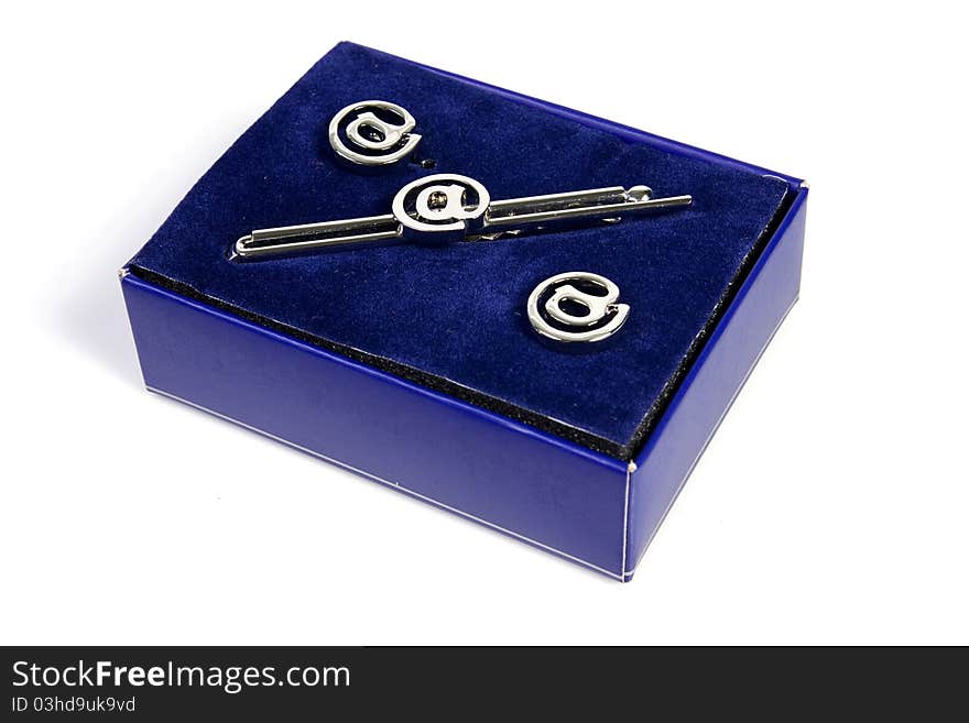 Tie clip and cufflinks formalwear accessory in the purple box