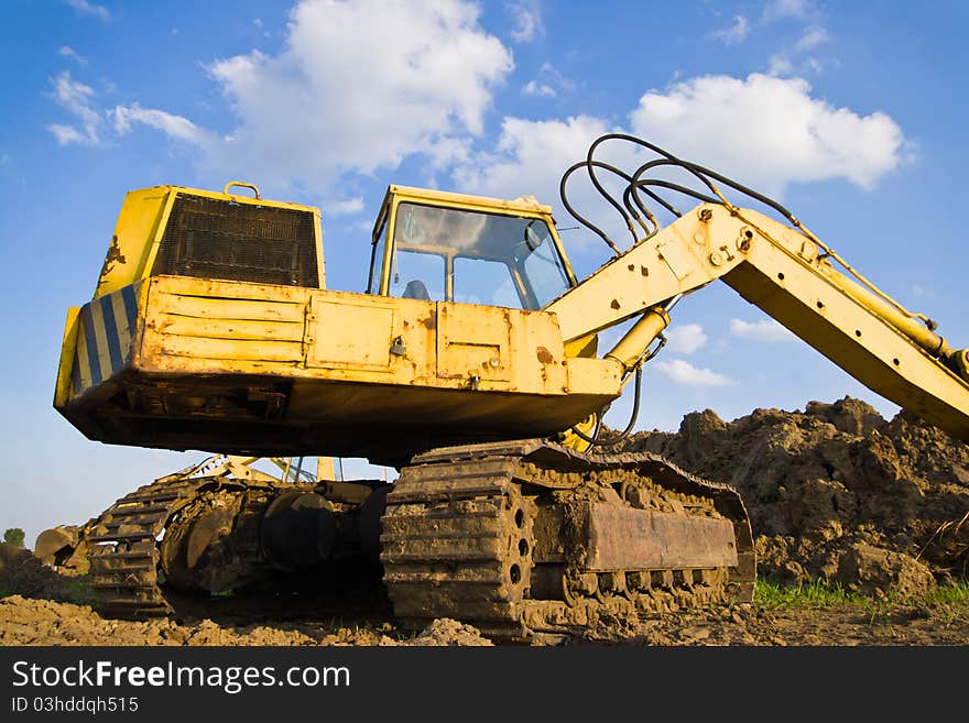 Digger, Heavy Duty construction equipment parked at work site