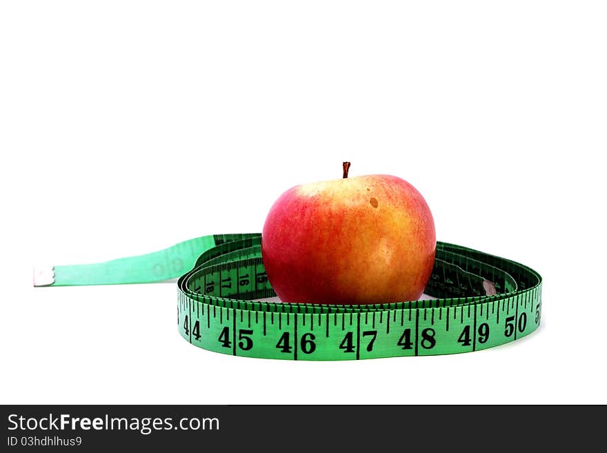 Red apple with measuring tape