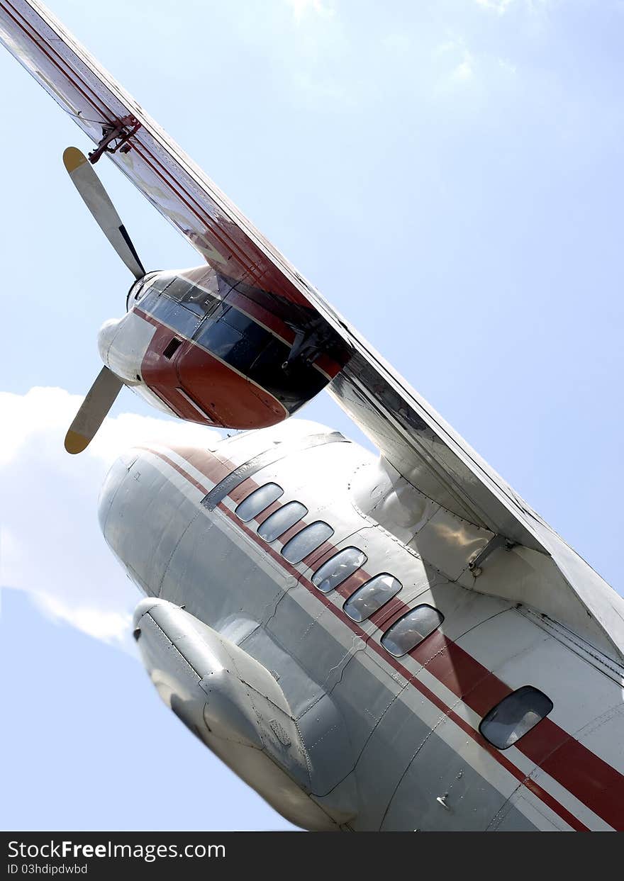 Wing, engine, propeller, porthole, plane