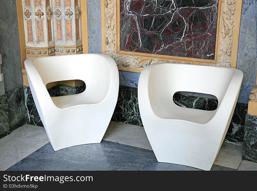 White Armchairs On Marble