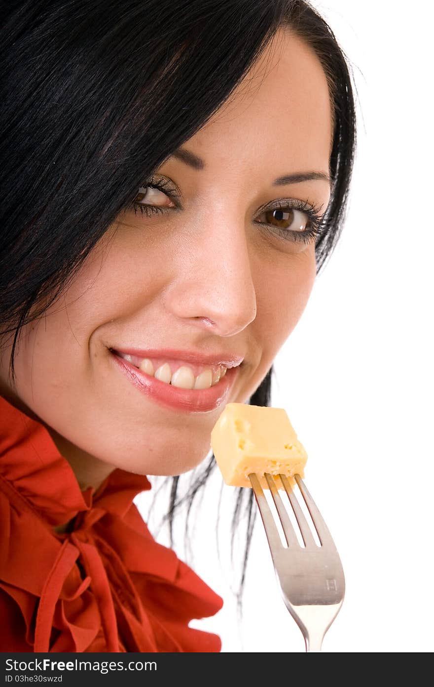 Attractive pretty brunette in red, with a delicious slice of cheese on a fork. Attractive pretty brunette in red, with a delicious slice of cheese on a fork