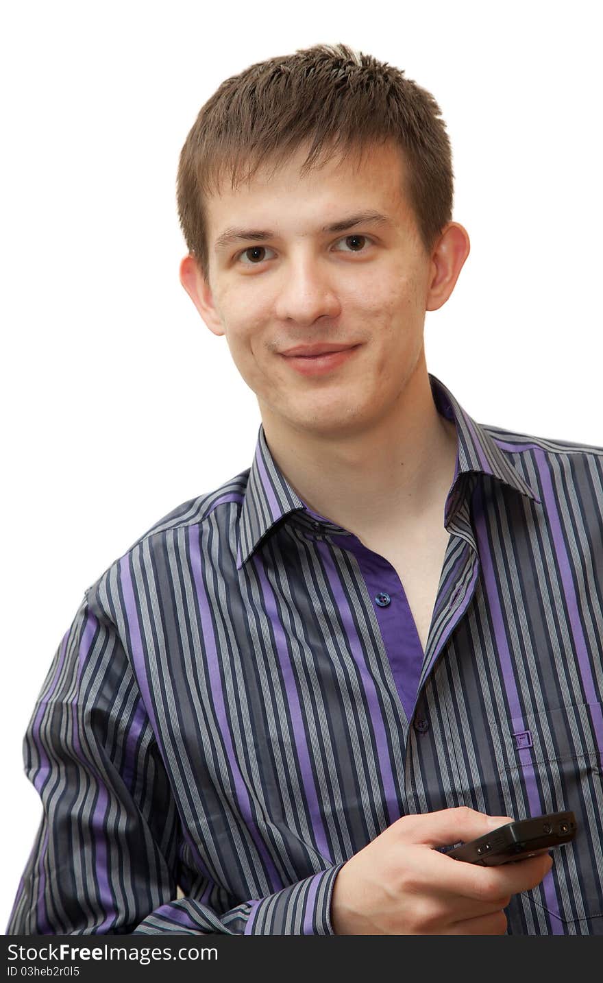 A young man with the phone in a shirt with a white background