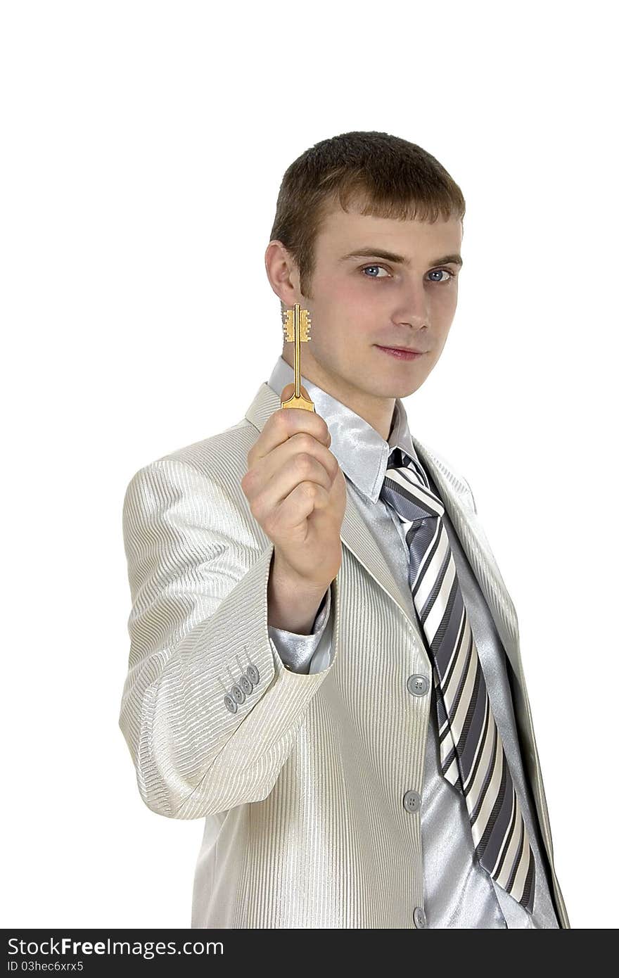 Businessman holding the key to success.