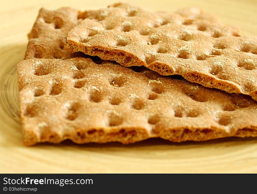 Crackers On Wooden Plate