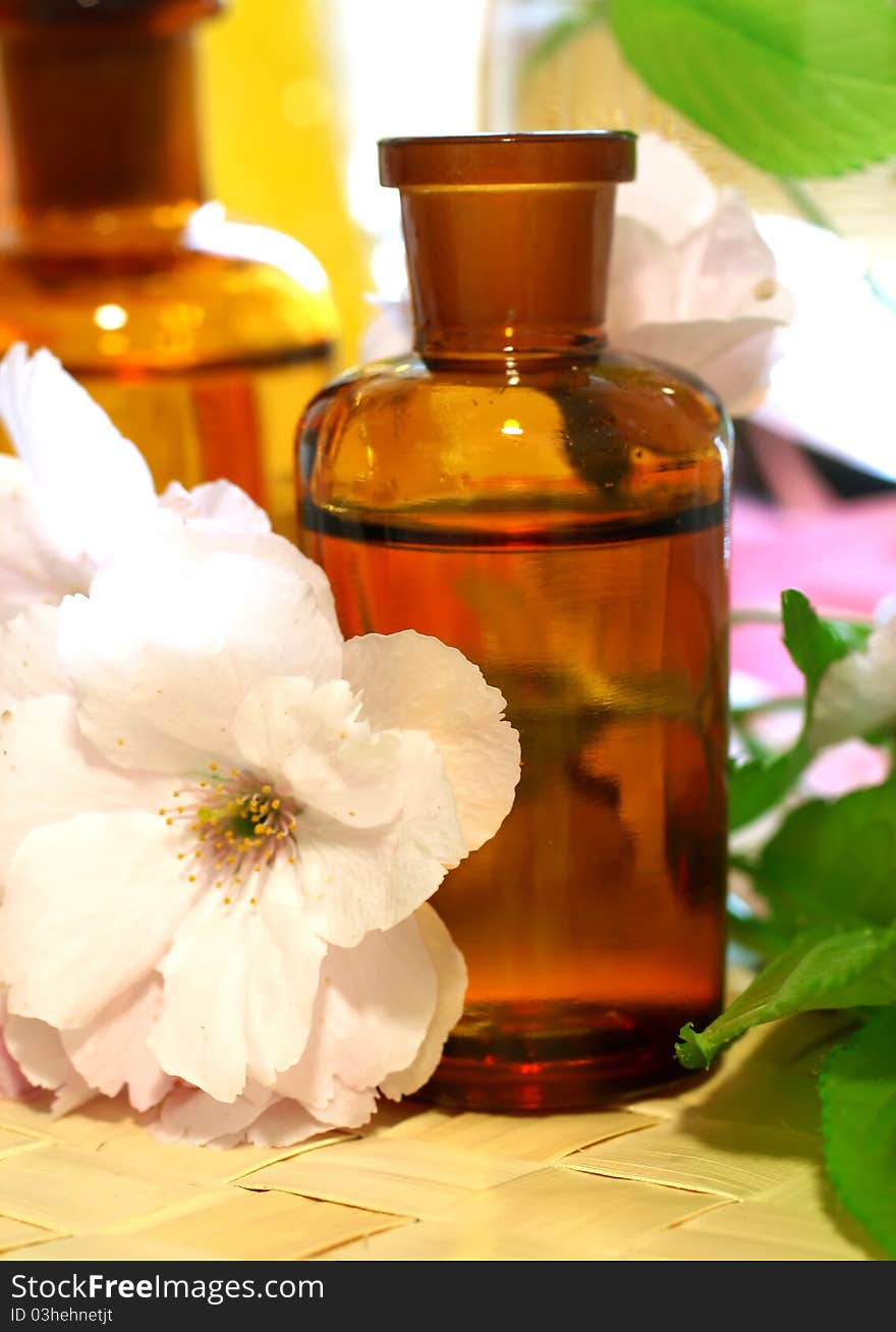 Beautiful spa composition of bottles and flowers