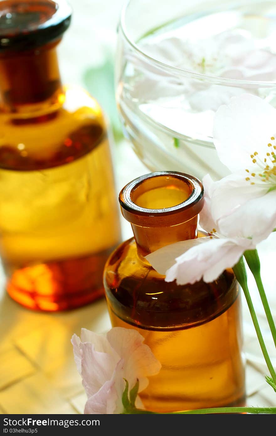 Beautiful spa composition of bottles and flowers