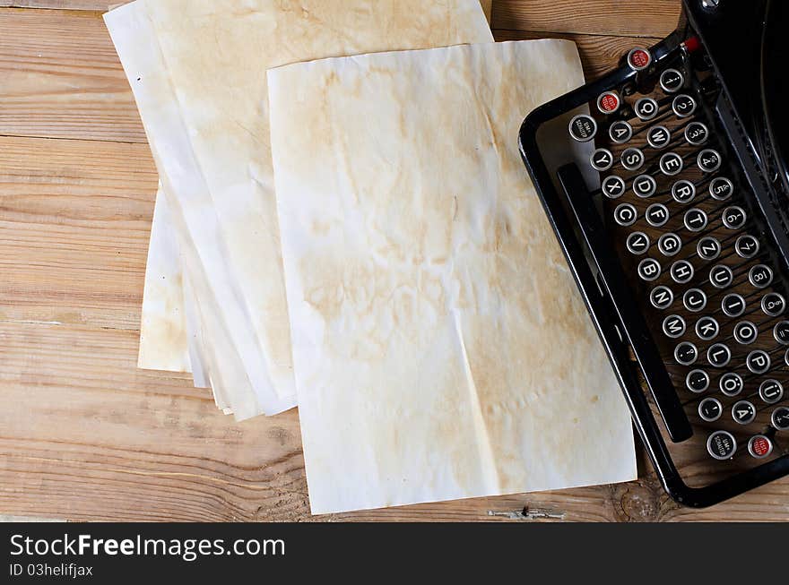 Old paper on a wooden background