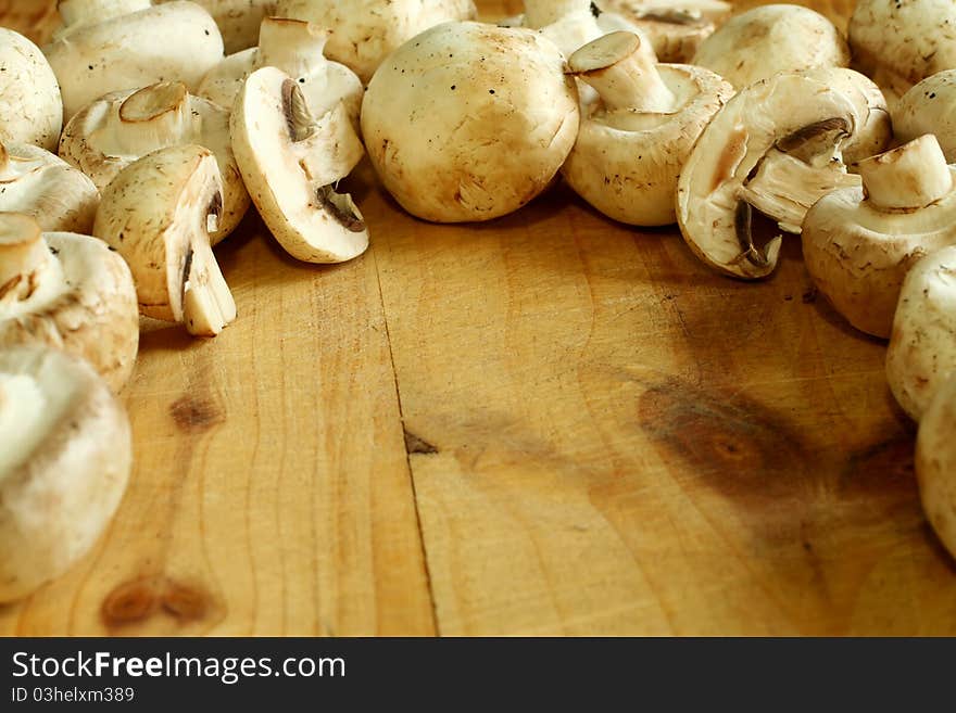 Fresh mushroom on wooden boards