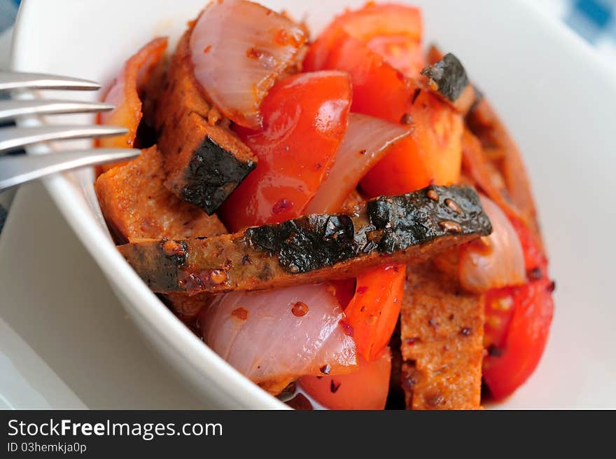 Sliced fish in spicy hot sauce