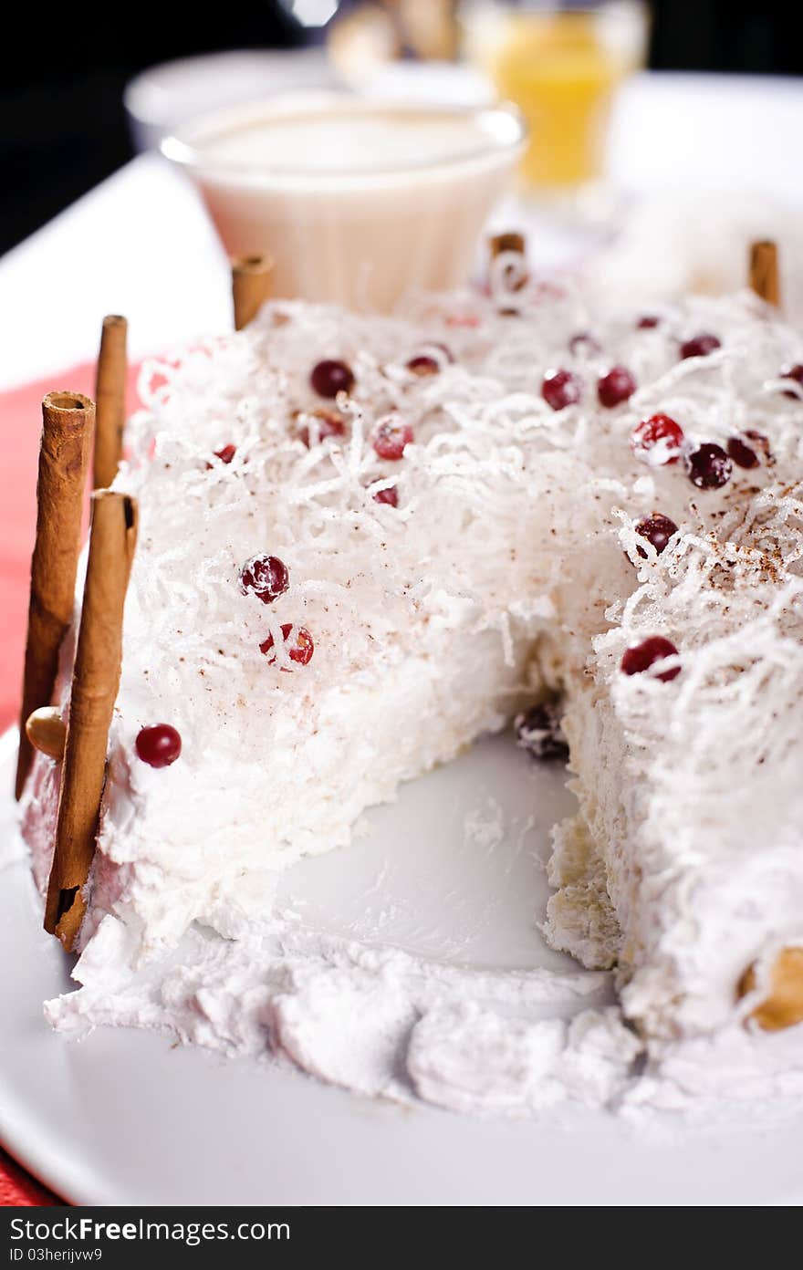 Piece of cake on white plate with milk cocktaile