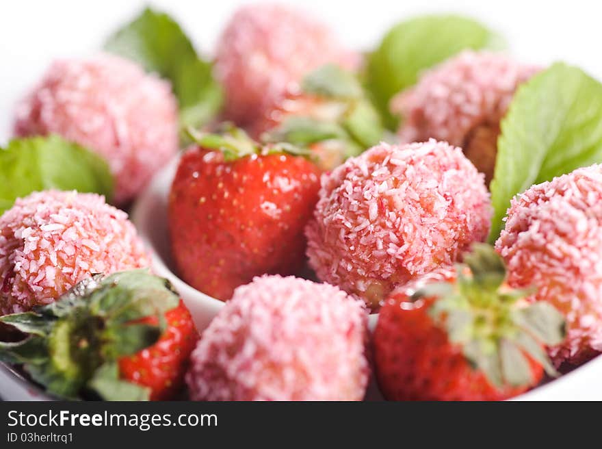 Piece of cake on plate with berries and fruits