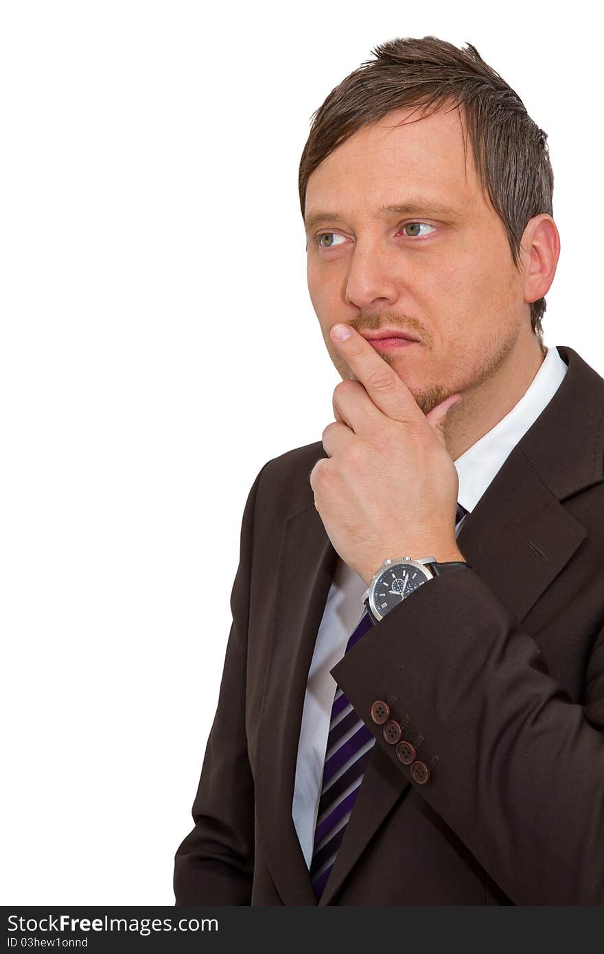 Photo of a businessman with a thoughtful expression. Photo of a businessman with a thoughtful expression