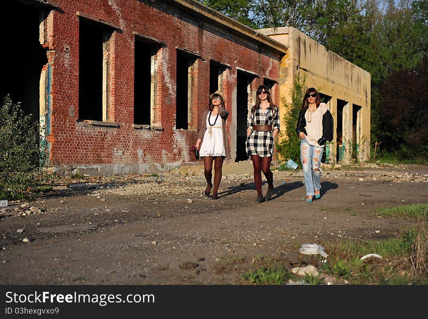 Portrait with beautiful young women walking, stylised vintage