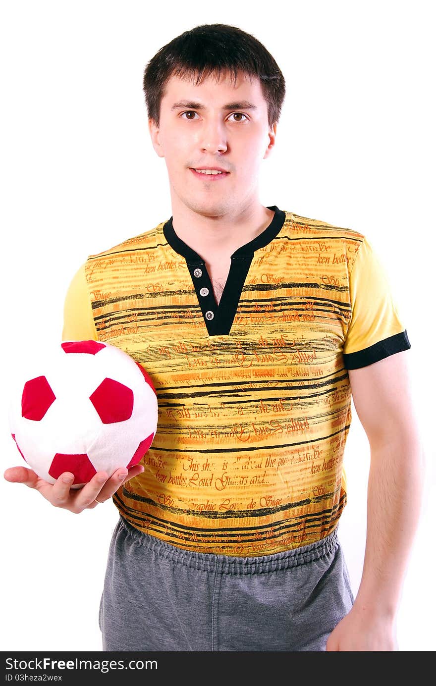 Male holding a soccer ball.