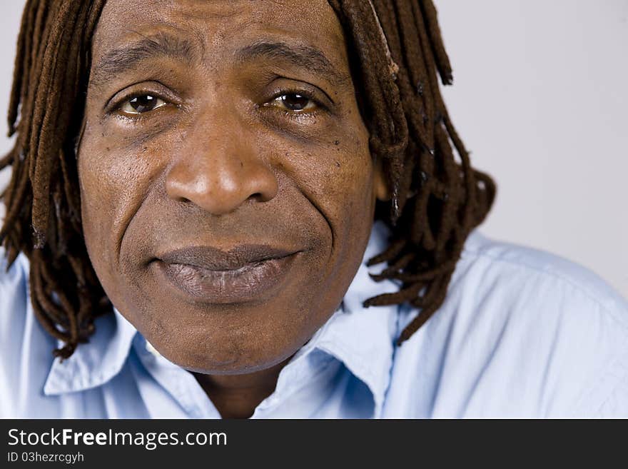 Closeup Portrait of an African American Businessman with Dreadlocks. Closeup Portrait of an African American Businessman with Dreadlocks