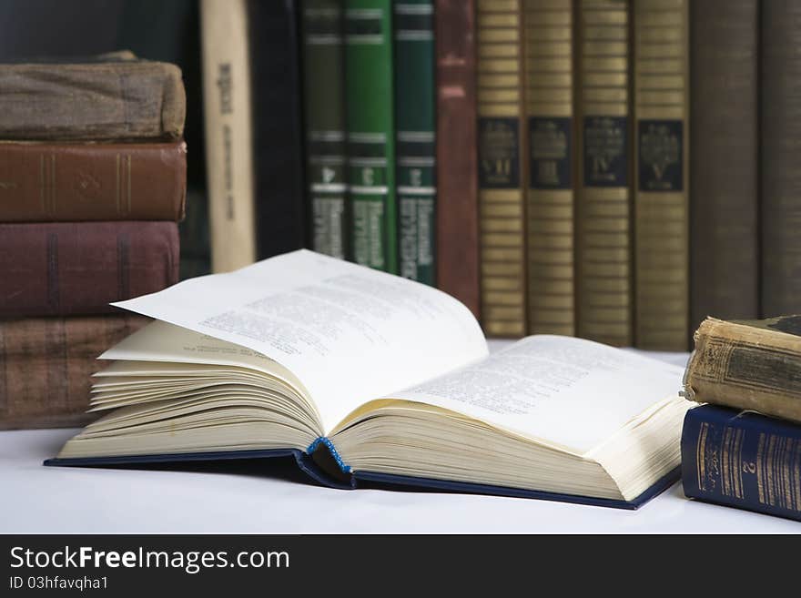 The open book on a table in library