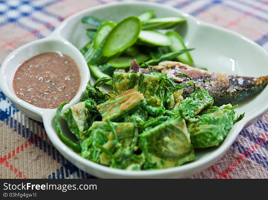 Fried Mackerel fish,chili sauce ,and fried vegetab