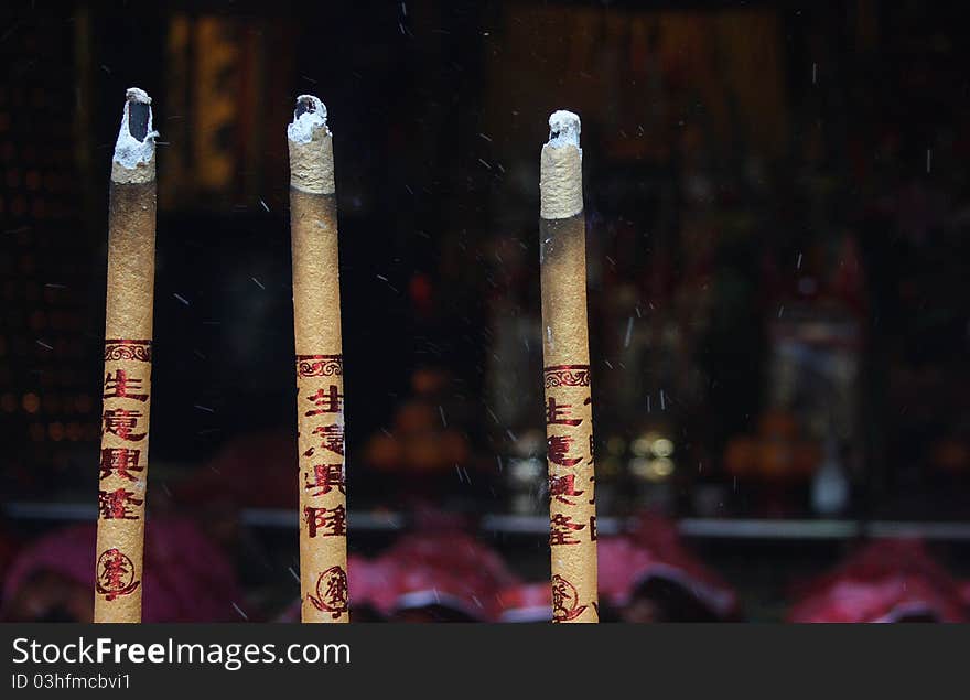 Incense Burning In A Temple