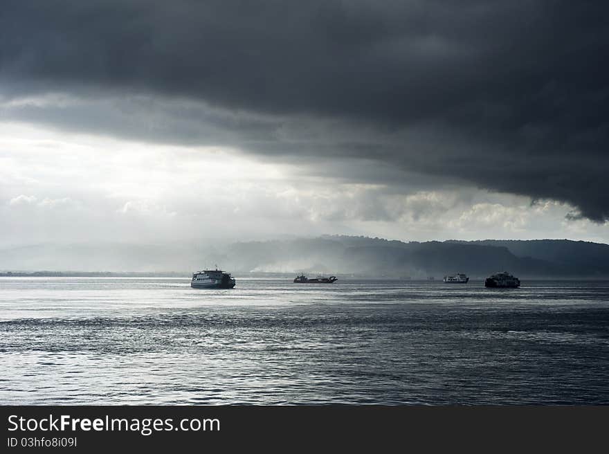 Ferry from Java to Bali under the storm. Indonesia