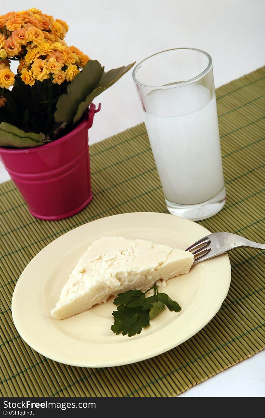 Turkish raki and cheese on a table