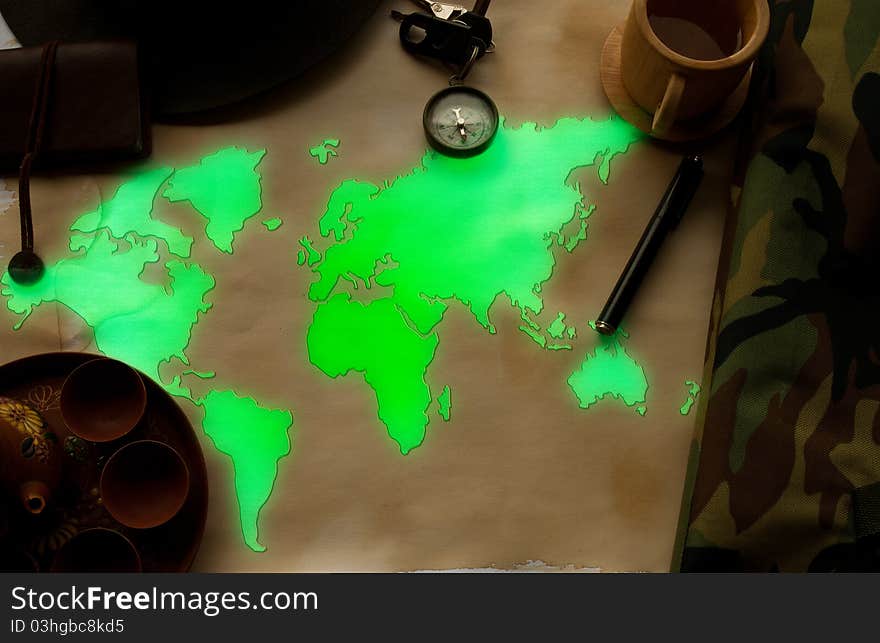 World map glows in the old paper