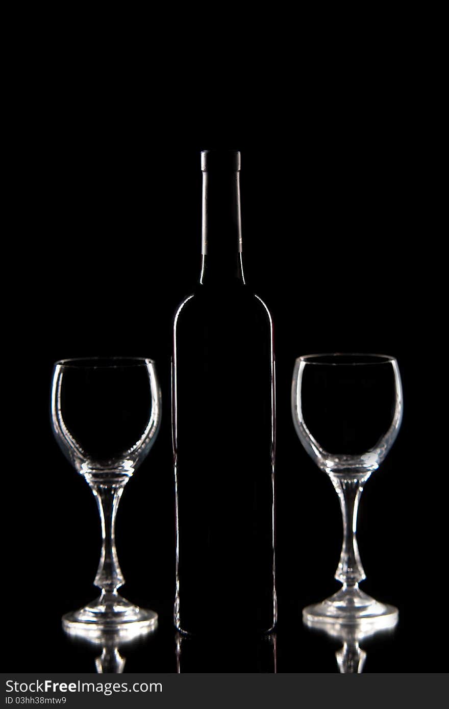 Red wine - silluette of bottle and glasses with red wine. Red wine - silluette of bottle and glasses with red wine