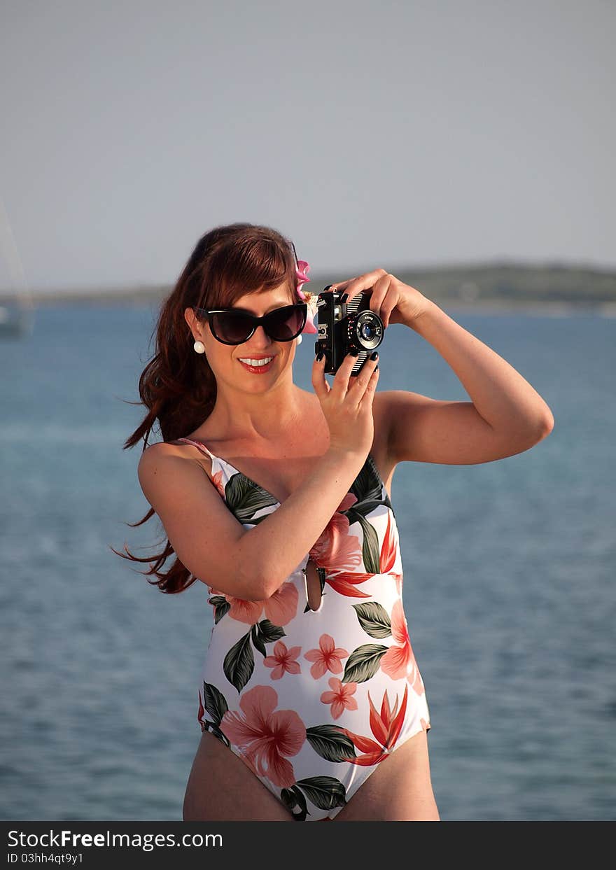 Retro girl having fun at the beach. Retro girl having fun at the beach