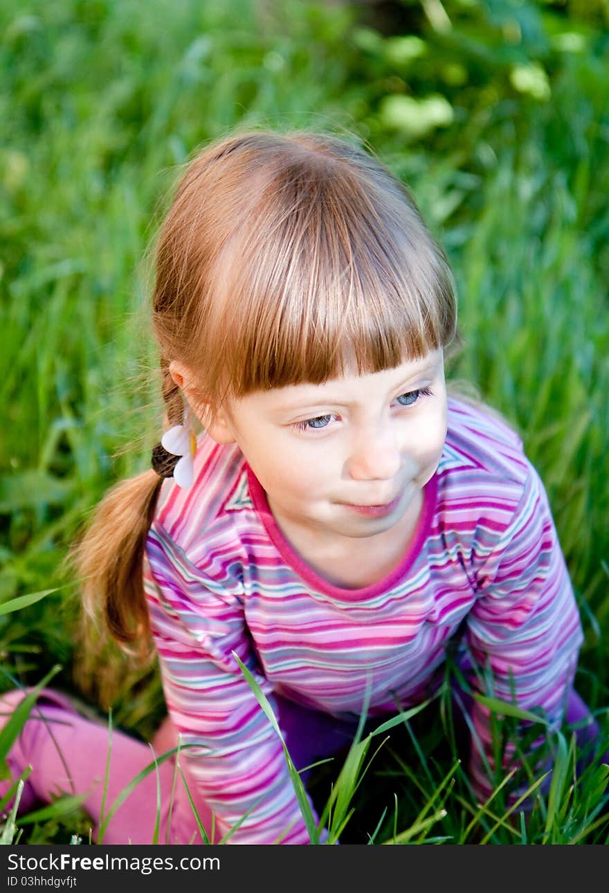 Cute toddler  girl in the garden