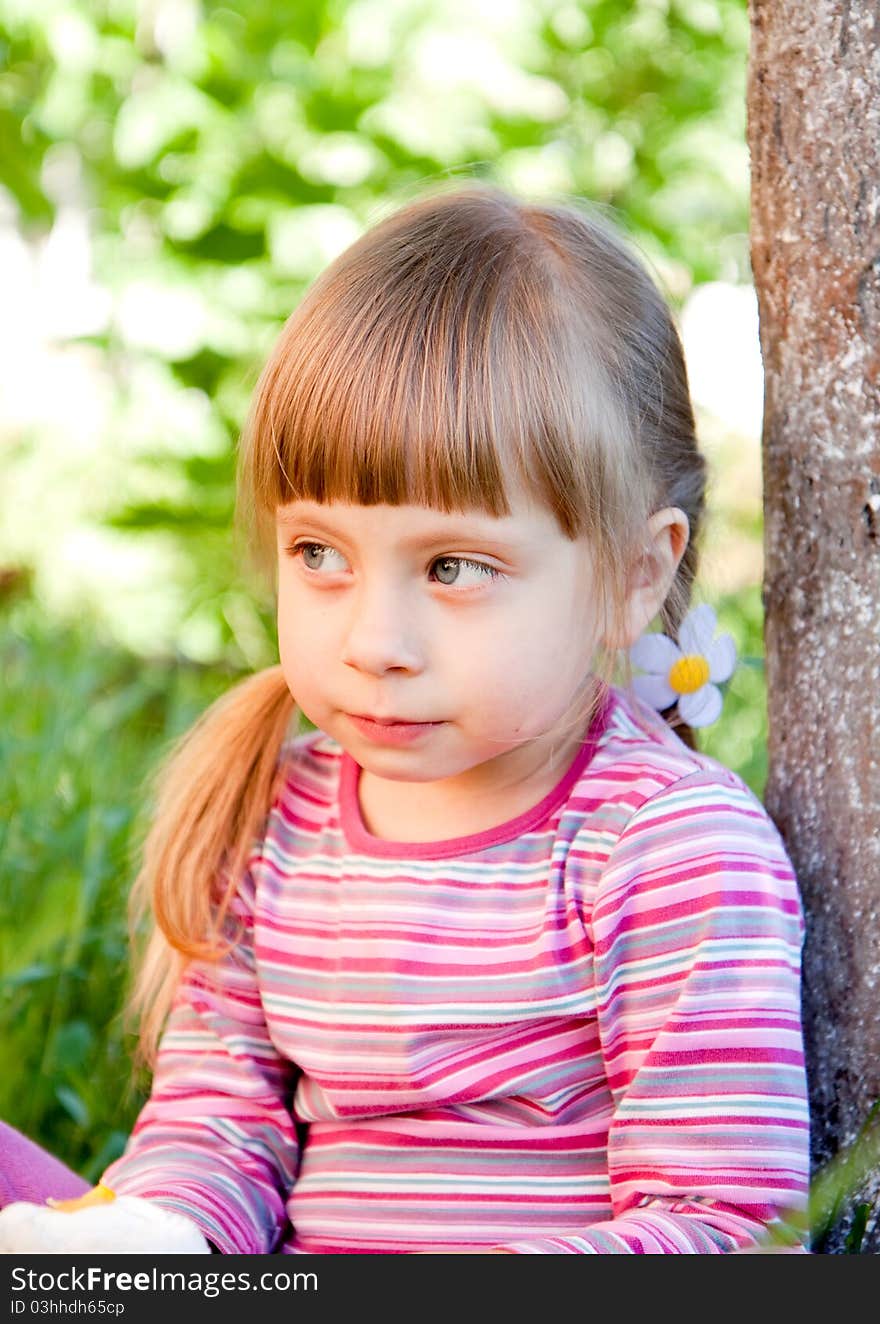 Cute toddler a girl in the garden