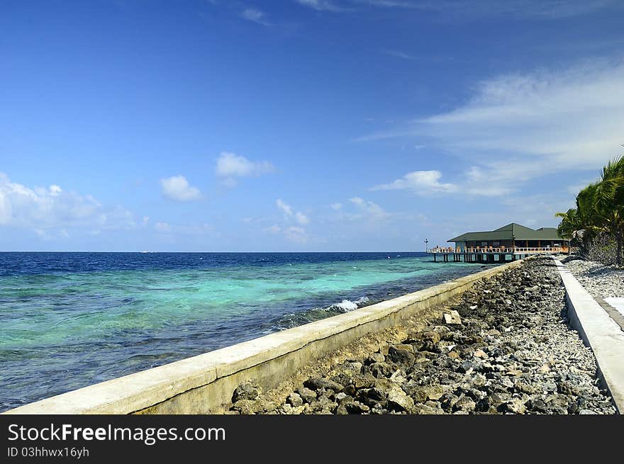 Paradise island of Maldives with blue lagoon and Restaurant. Paradise island of Maldives with blue lagoon and Restaurant