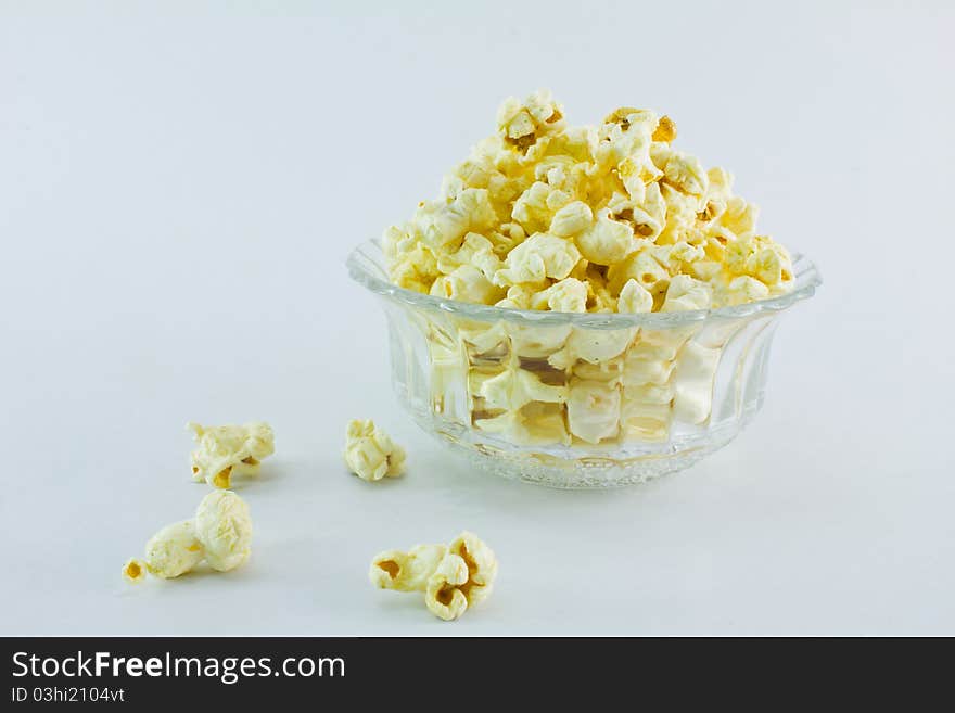 A bowl of popcorn isolated on white background