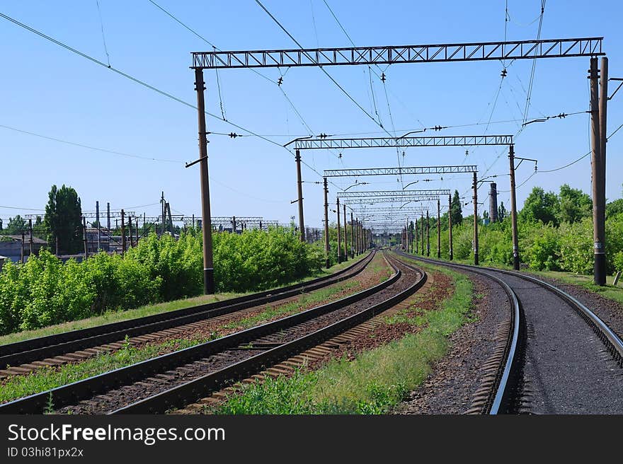 Railway a track with electric wires. Railway a track with electric wires.