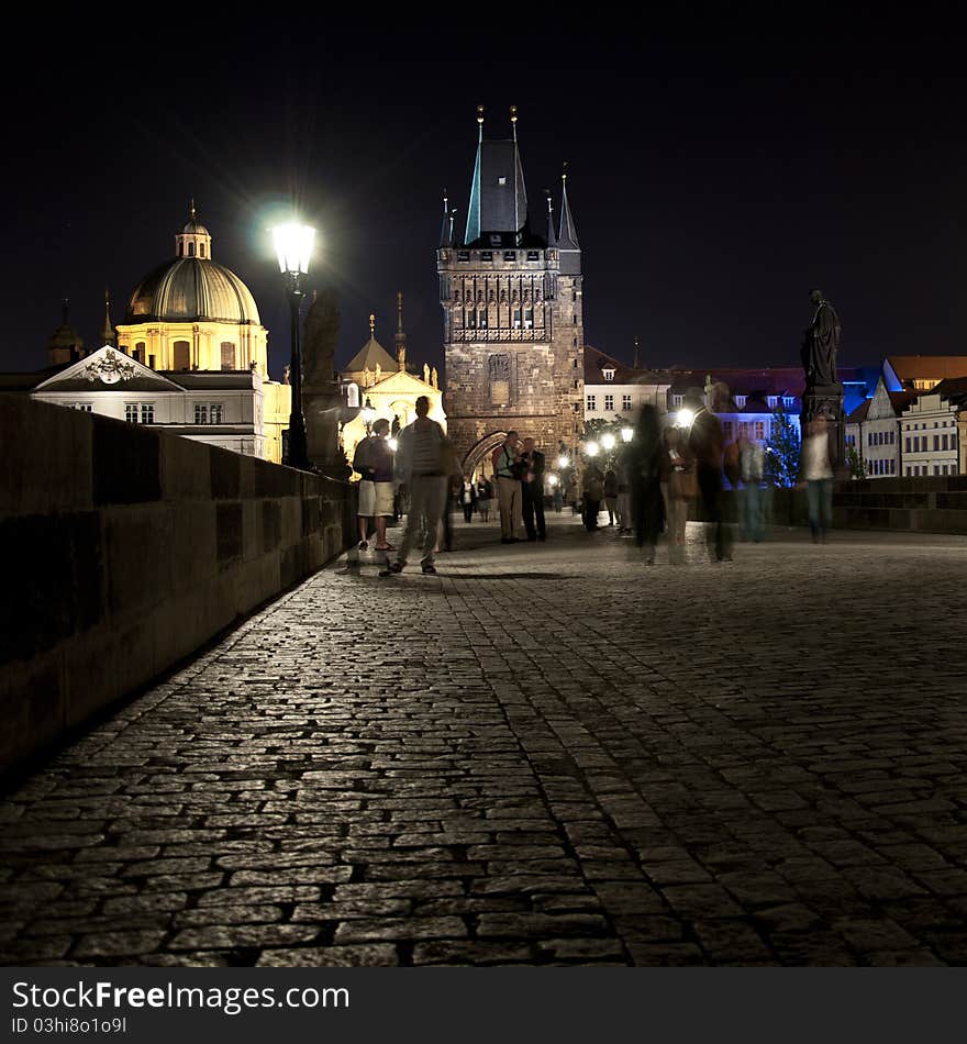 Charles bridge at night with people ghosts. Charles bridge at night with people ghosts.